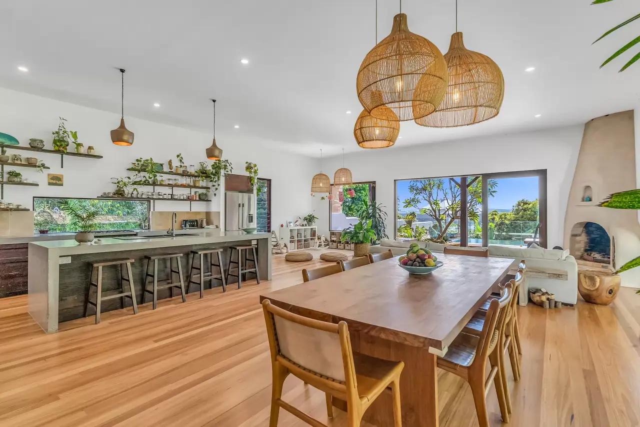 Open kitchen and dining room with timber floors